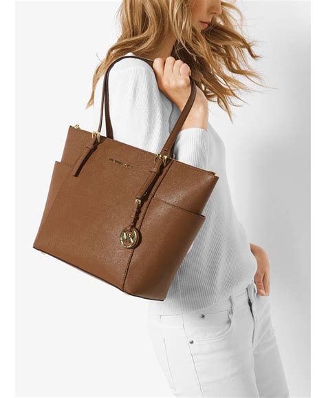 michael kors handbag jet set east west top zip tote|michael kors saffiano tote bag.